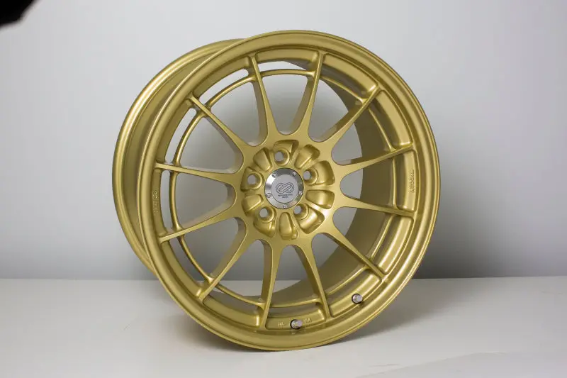 18X9.5 Enkei Nt03+M, 5X100 40Mm Offset Gold Wheel 1