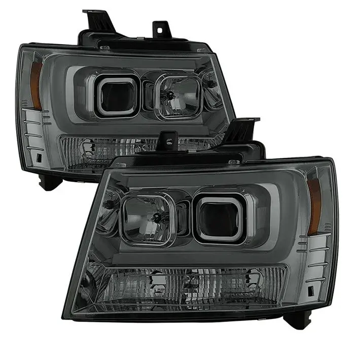 2007-2014 Chevy Suburban 1500/2500 / 2007-2014 Chevy Tahoe / 2007-2014 Avalanche Version 2 Projector Headlights - High H1 (Included) - Low H7 (Included) Light Bar Drl - Smoke 1